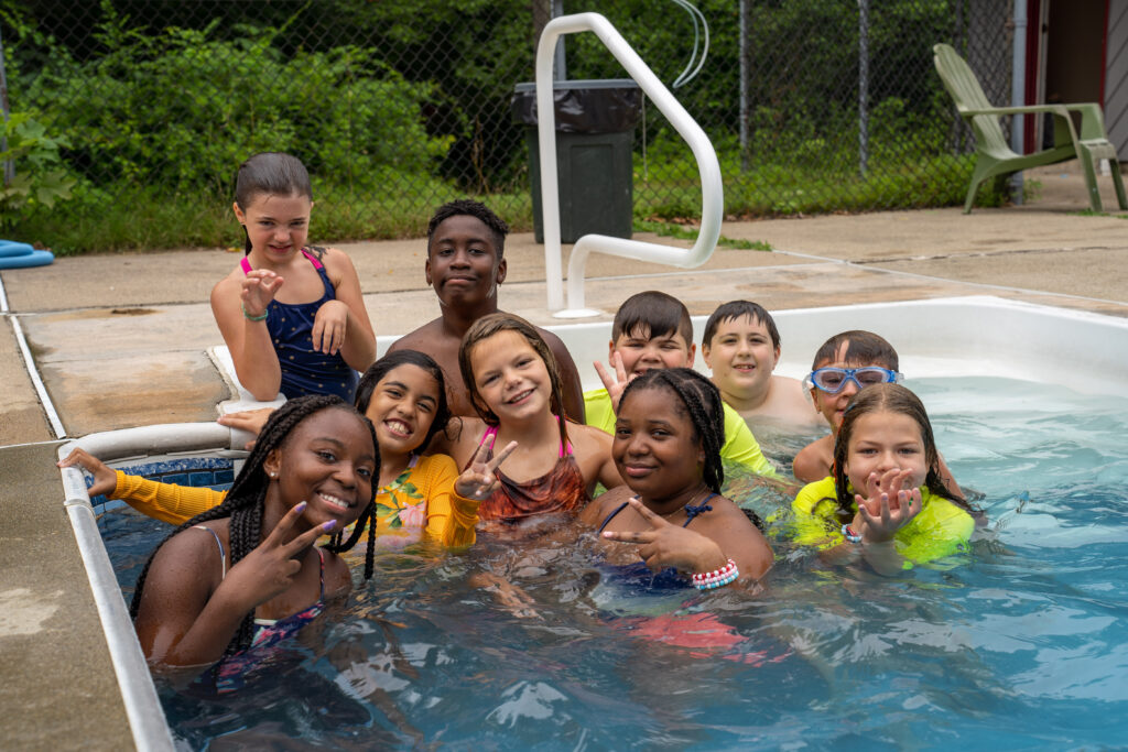 Summer Campers at Johnsonburg hang out in the pool